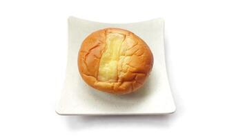 Display of delicious double cheese bread on white plate photo