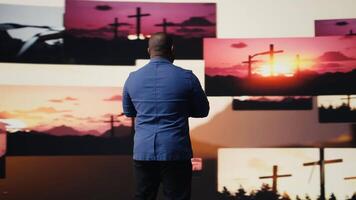 Young adult embracing the presence of Jesus with eyes closed in calm reflection, praying to evoke worshipping, harmony and a sacred connection to heaven for inner strength. Christianity. Camera A. video