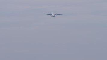 Turboprop aircraft with unknown livery on final approach for landing. Travel, aviation, and adventure theme. video