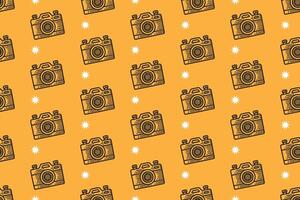 vintage camera with star doodle seamless pattern on yellow background for packaging and merchandise. retro photography engraving pattern background. analog camera hand drawn illustration motif design vector