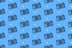 retro camera with light doodle pattern on blue background for packaging and merchandise. vintage photography engraving seamless pattern background. hand drawn photo gear motif wallpaper design vector