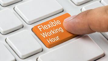 Flexible working. Flexible working hour remote work life balance keyboard button office job, hybrid, work from home ,remote ,work life balance photo