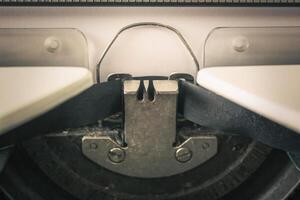 close-up of typewriter with paper sheet, Space for your text. photo