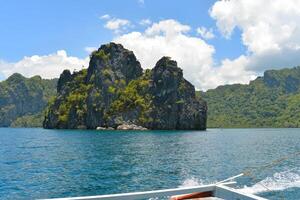 Picturesque rocks in El Nido, Palawan island, Philippines. View from a boat photo