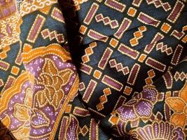 a close up of a colorful patterned fabric photo