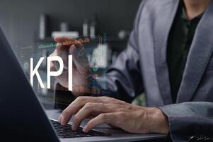 Businessman Analyzing KPI Data for Performance Review and Strategy photo