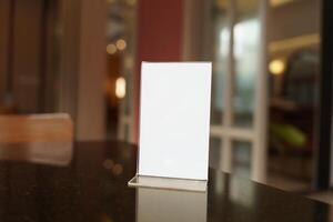 Menu mock up blank white on a table in a restaurant photo