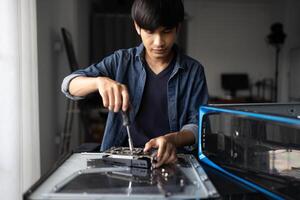 a Engineer installing Hardware working on a computer photo