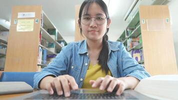 POV Young Woman Work On Laptop Computer Typing Point Of View At University Library video
