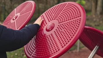 Engaging and vibrant red playground equipment designed specifically for childrens fun and social interaction video
