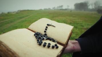 Open Christian Religious Book Read By Man In Dull Park video