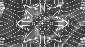 Abstract grayscale mandala design with intricate geometric patterns and swirling lines creating a mesmerizing visual effect. video