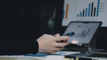 Man using smartphone in office video