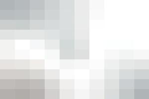 Abstract mosaic of light gray and white squares creating a subtle gradient effect vector