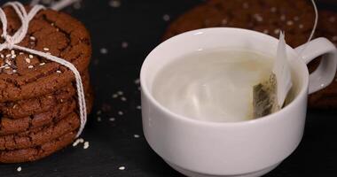 cookies with cocoa and sesame, delicious chocolate-flavored cookies on the table photo