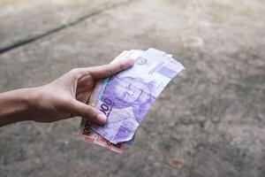 showing Indonesian money as a legal payment instrument photo