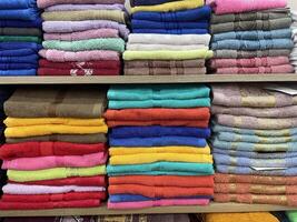 Soft Cotton Towels Arranged by Color in a Retail Store for Home and Bathroom Use photo