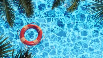 Colorful Lifebuoy Floating in Clear Blue Pool photo