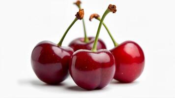 A group of ripe cherries is isolated on a white background for use in food, nutrition, or fruit-related projects. Suitable for healthy eating or summer themes. photo