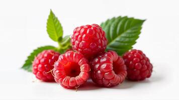 Ripe raspberries and green leaves isolated on a white background. Suitable for food, nutrition, and healthy eating concepts. photo