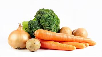 Assorted fresh vegetables - broccoli, carrots, potatoes, and onion isolated on a white background. Useful for food, nutrition, and healthy eating concepts. photo