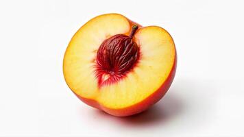 Isolated half of a ripe peach with exposed pit and yellow flesh on a white background. Useful for food, nutrition, and healthy eating concepts. photo