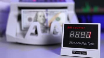Electronic equipment for counting paper money. Financial transactions. Modern cash counter machine calculates paper banknotes. video