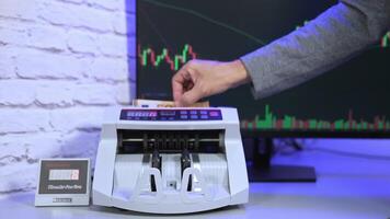 Euro currency on counting machine. 50 euro banknotes counting in the machine. Counting mechanism is processing euros. video