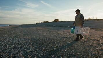Fisherman Arriving At The Beach To Fish video