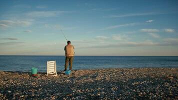 Man Holding The Rod In The Water While Fishing video