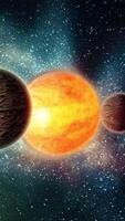 The bright planet Sun rotates in space. Around it circle several satellites with a mountainous rocky structure. video