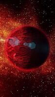 A bright red planet with a rocky, textured surface dotted with meteorite craters orbits in space. video