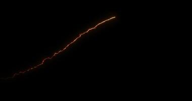 A trail of sparks left by a rocket. Flight of fireworks. Abstract animation.33 video