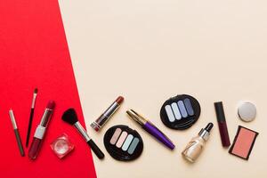 Professional makeup tools.decorative cosmetics. Makeup brushes set and color eyeshadow palette on table background. Minimalistic style photo