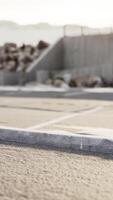 CGI Empty beach car park spaces covered in asphalt. video