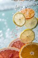 Citrus Slices in Sparkling Water, Lemon, Orange, Grapefruit, and Lime photo