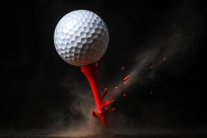 White golf ball soaring upwards from shattered red golf tee at moment of impact photo