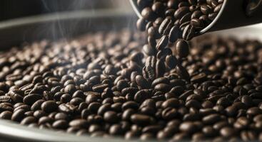 Freshly roasted coffee beans cascading into a cooling tray with visible steam photo