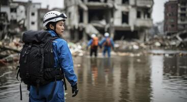 Female search and rescue worker in blue suit and helmet navigating flooded urban disaster zone photo