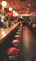 Diner interior with classic red stools and warm lighting evoking nostalgia and a retro atmosphere a vintage setting photo
