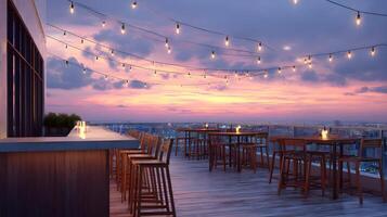 Rooftop Bar with Wooden Furnishings under Strings of Lights at Sunset Skyline photo