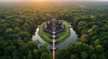 Majestic Angkor Wat temple in Cambodia at golden hour an aerial perspective of ancient architecture surrounded by vibrant jungle photo
