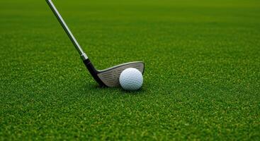Golf ball and club resting on lush green grass ready for a swing on a sunny day perfect for sports and recreation themes photo