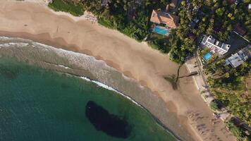 Aerial view of an emerald green sea and big foaming waves. Indian Ocean. photo