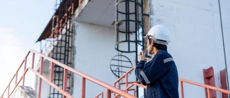 maintenance. Maintenance engineers are using walky talky to inform the results of inspection of buildings and structures. Irrigation engineers are exploring sluice systems photo