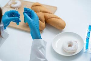 Scientist check chemical and fungus in laboratory. Control experts inspect the concentration of chemical residues. hazards, standard, prohibited substances, contaminate Microbiologist. photo