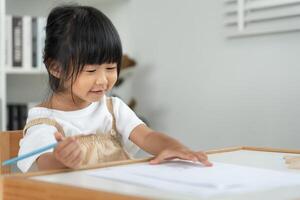 Portrait Happy Asia children learning and enjoy paint. family is happy and excited in the house. daughter having fun spending time together, Activity, Executive Function photo