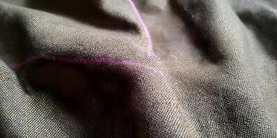 Brown Fabric Texture Close Up Detailed Linen Material Drape Brownish Grayish Beige Textile Background photo