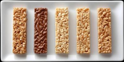 Five Cereal Bars Chocolate and Rice Crisp Snacks on White Plate photo