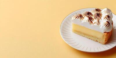 Lemon Tart Slice with Meringue Topping on Plate photo